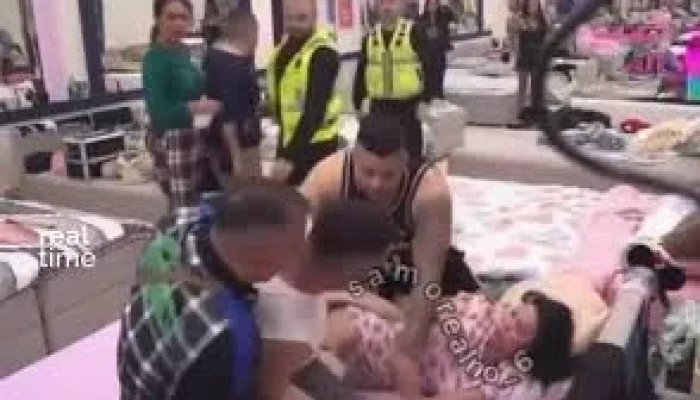 Participante de Reality Show Sérvio Tenta Enforcar Colega em Briga de Ciúmes; Segurança Intervém em Confinamento